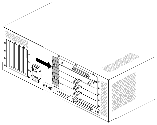 Figure 2-18 Sliding the XIO Board Retaining Plate Over the XIO Slots